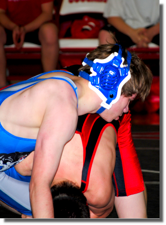 OSB wrestler grappling with another student