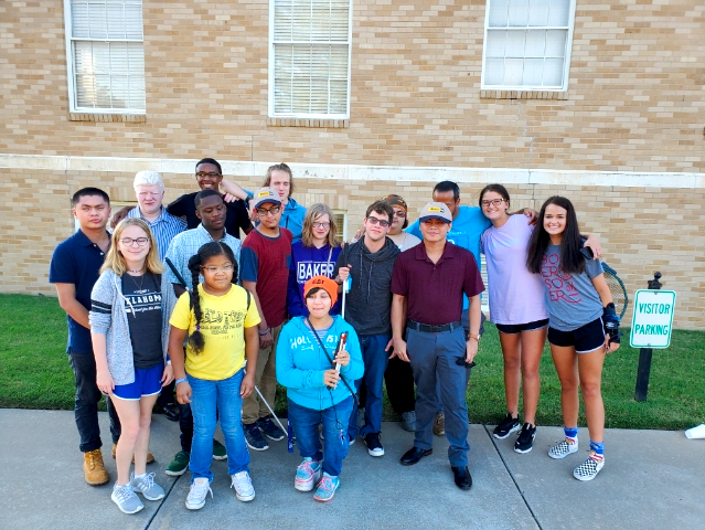 Group of students smiling for the camera