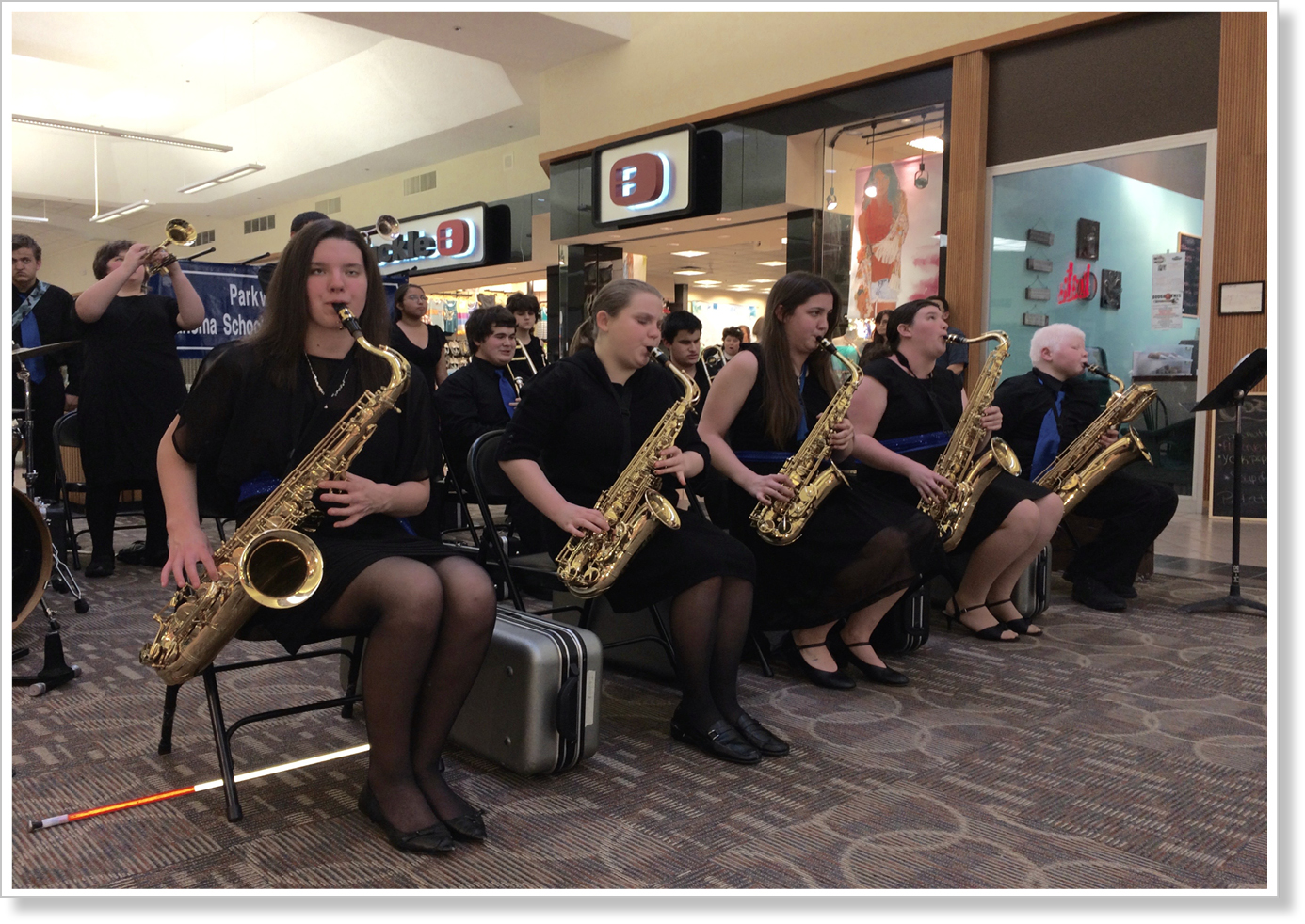 students playing saxophones