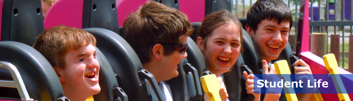 Four students smiling